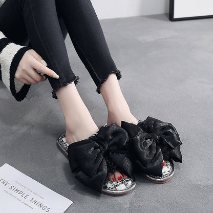 Clara – Fluffy Slippers with Large Bow Detail