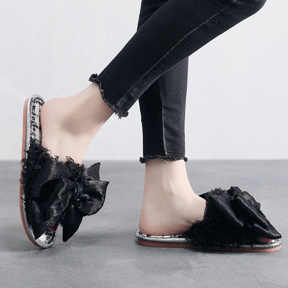 Clara – Fluffy Slippers with Large Bow Detail