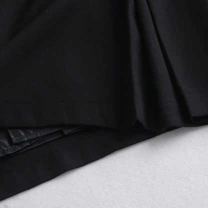 Clara – Wide Pleated Skirt with Chain Decoration