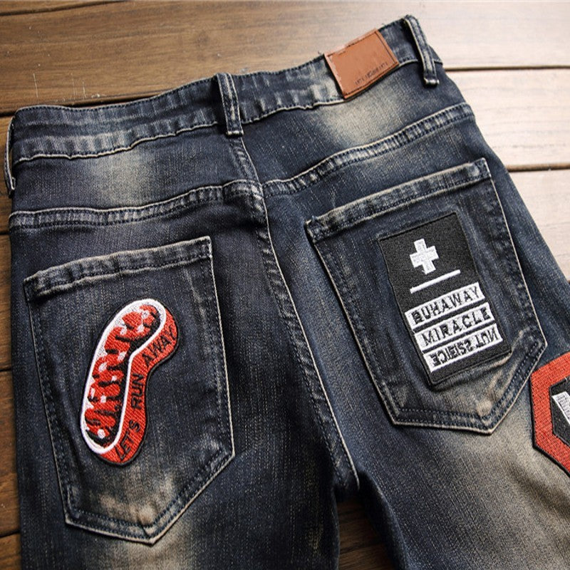 Ralph – Ripped Jeans with Badge Patch