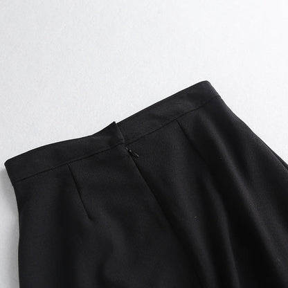 Clara – Wide Pleated Skirt with Chain Decoration